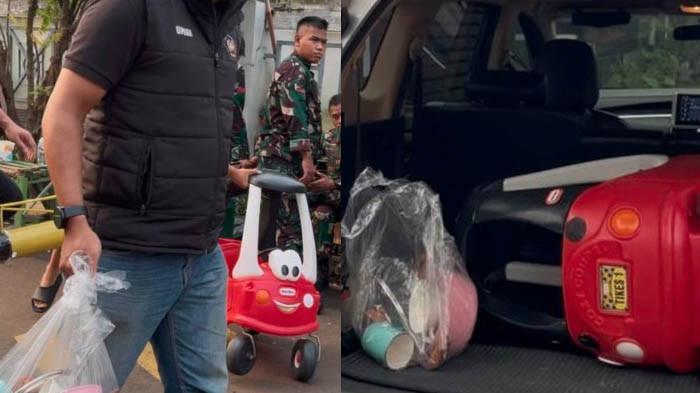 Polisi melihat barang yang dikembalikan warga ke rumah Menteri Keuangan Sri Mulyani